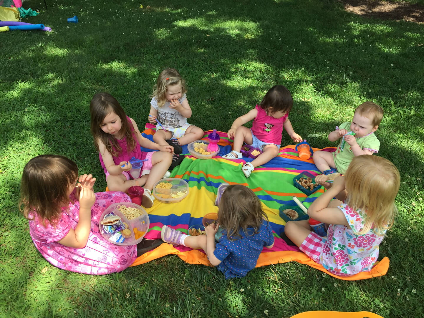 Children having a picnic on the lawn